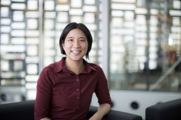 Eva Cheng wearing a red shirt