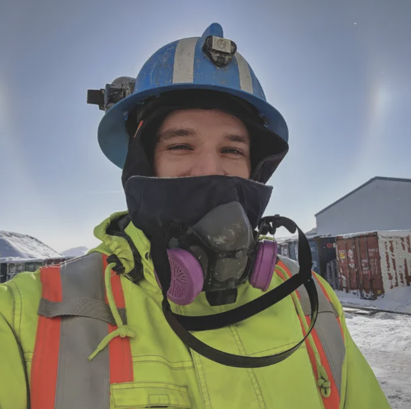 Man in hi vis wearing mask