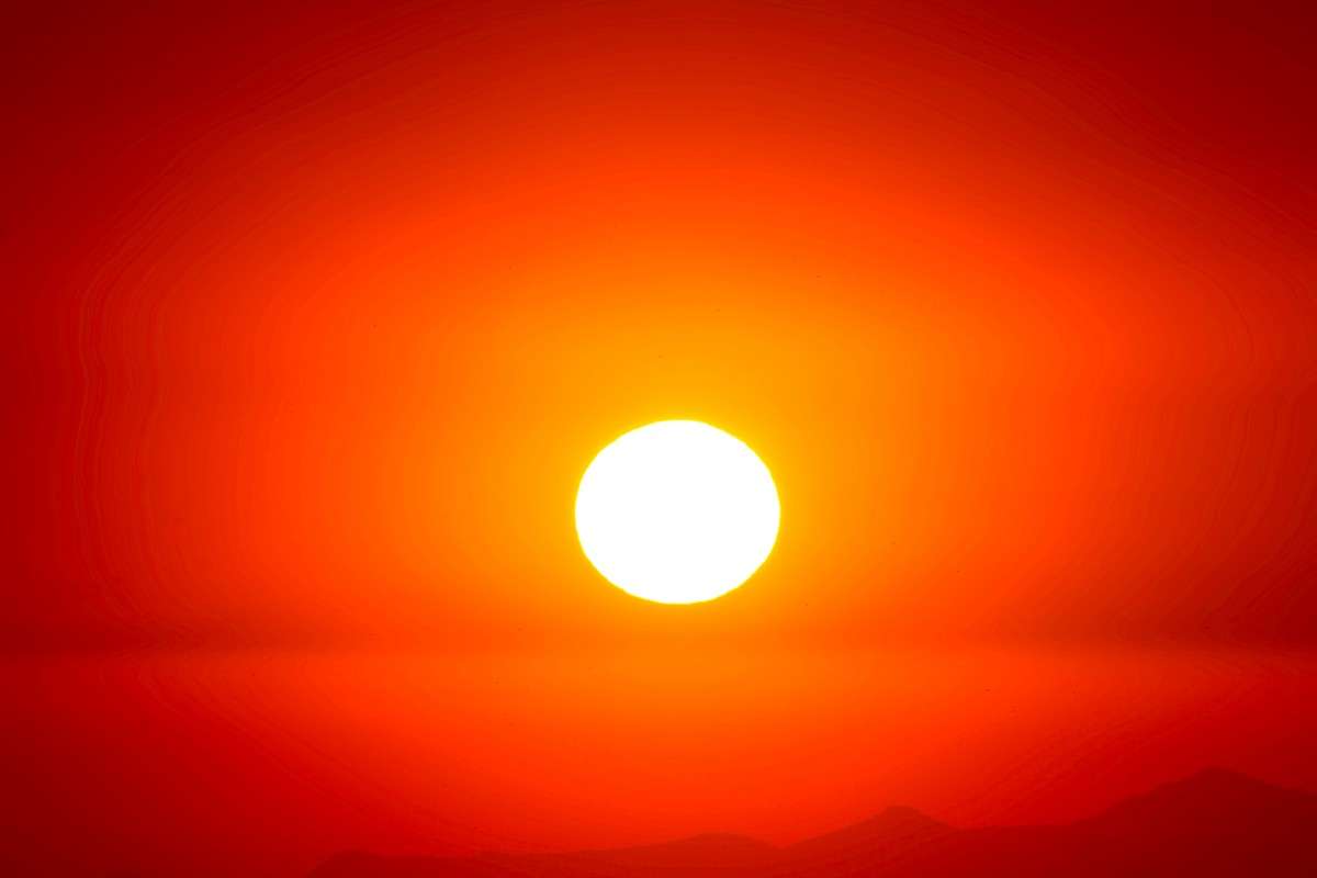 Warm sun in red sky