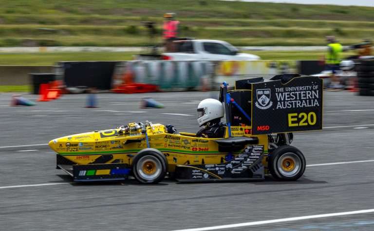 Yellow race car with driver